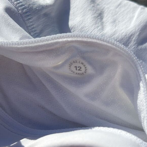Lululemon Pace Rival Skirt Regular 4 way Stretch 13"
White size 12 NWT tennis 🎾 - Picture 6 of 10